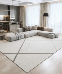 Modern room rug with a light cream background.